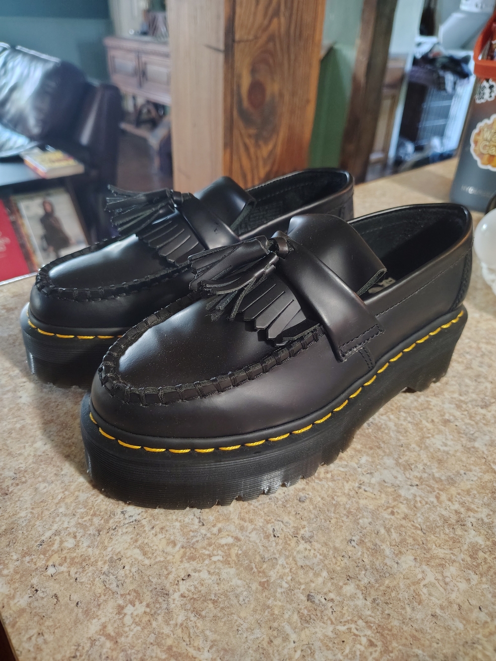Dr. Martens Black Platform Tassel Kiltie Loafers with Yellow Stitching
